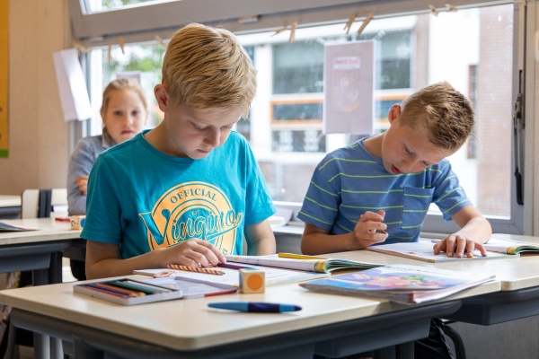 Hoe kan ik iets doorgeven aan de leerkracht van mijn kind?